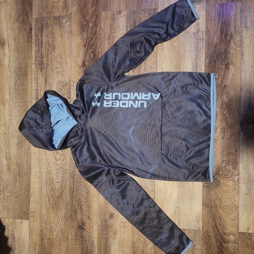 New without tags. Under Armour hoodie size youth medium.